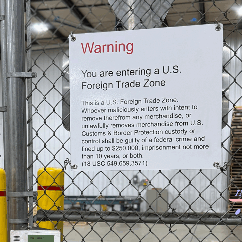 FTZ Photos with logo gate FTZ Foreign Trade Zone Fenced area at Inontime in Zeeland, Michigan warehouse.